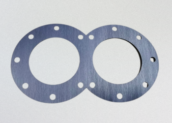 TOMBO No. 1120 加工事例｜スクリューポンプ ギヤケース用ガスケット　株式会社ダイコー